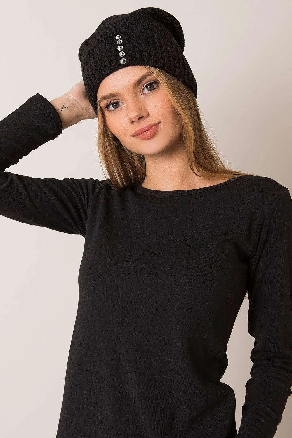 Women's winter hat with a smooth texture