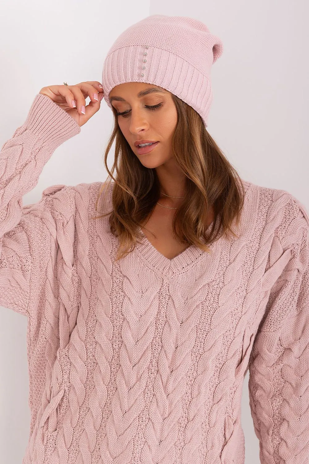 Women's winter hat with a smooth texture