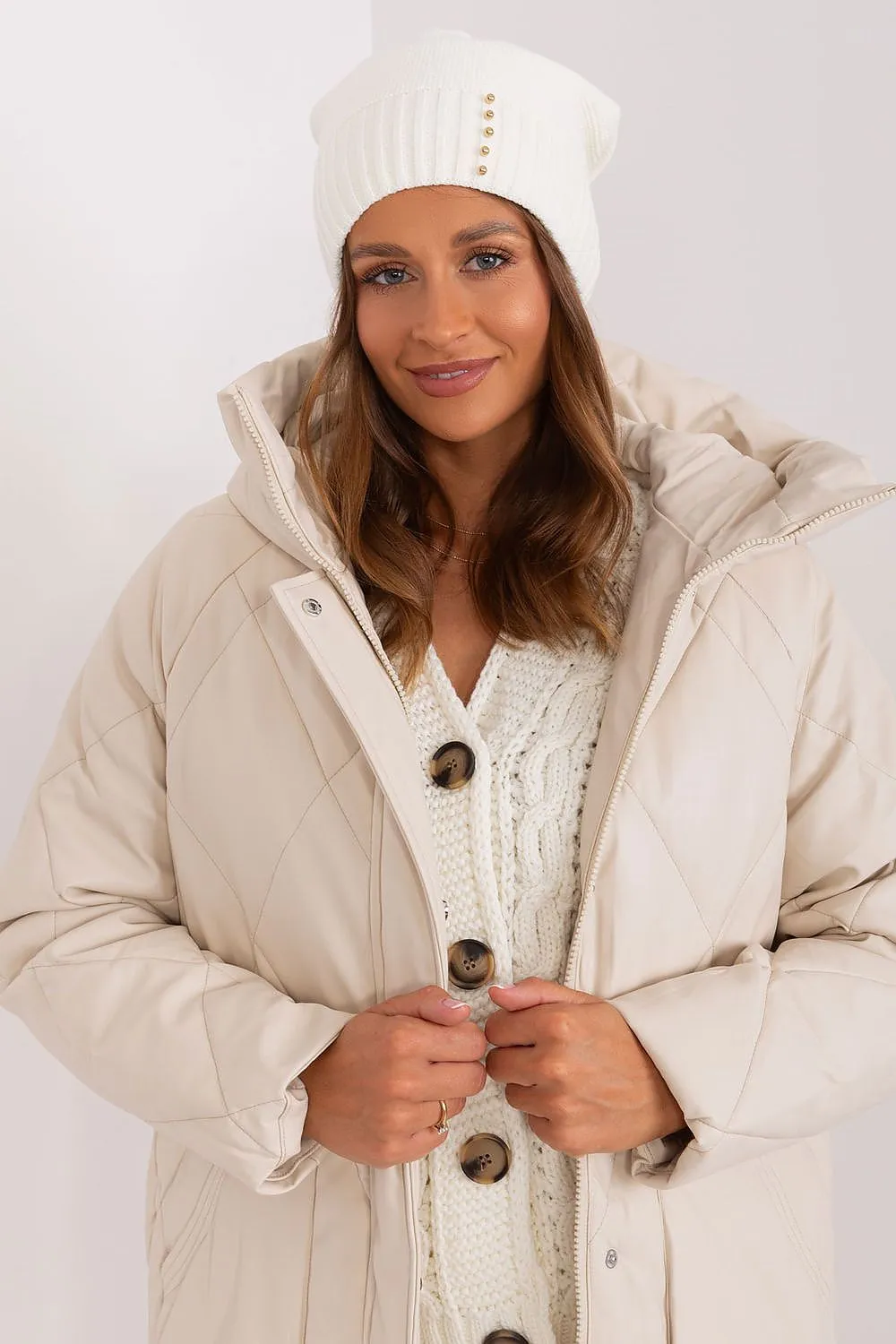 Women's winter hat with a smooth texture